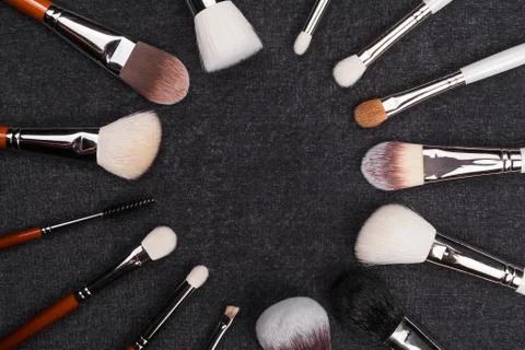 Makeup brushes forming a circle themselves Stock Photos