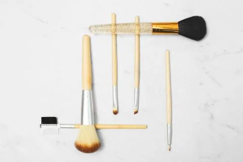 Makeup-brushes-on-marble  Stock Photos