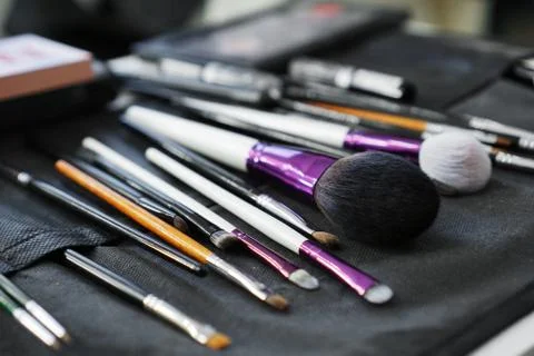 Makeup brushes set in case Stock Photos