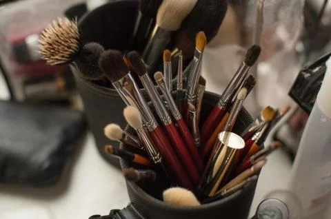 Makeup brushes in the stand Stock Photos