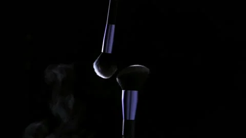 Makeup brushes' touch on black background Video stock 167347861