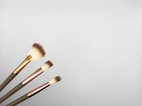 Makeup Brushes on white background. copy space, flat lay, top view Stock Photos