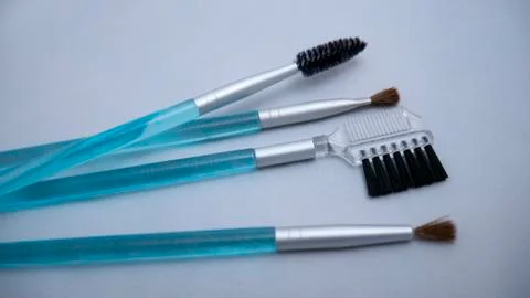Makeup brushes on a white background. Makeup tools. Stock Photos