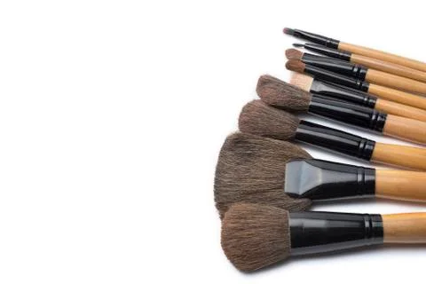 Makeup brushes on white isolated background for female beauty. Stock-Fotos