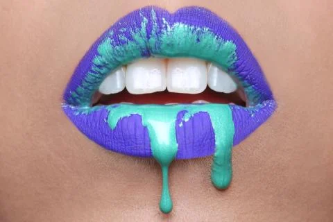 Makeup cosmetic creation using lip color Stock Photos