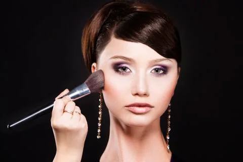 Makeup. Cosmetic. Perfect Make-up. Applying Make-up Stock Photos