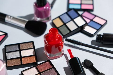 Makeup cosmetics on a blue background Stock Photos