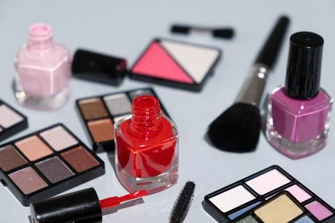 Makeup cosmetics on a blue background Stock Photos