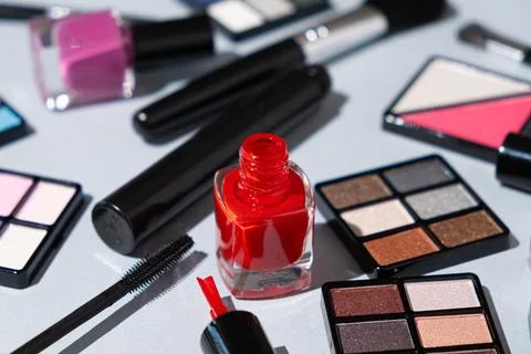 Makeup cosmetics on a blue background Stock Photos