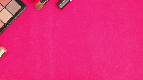 Makeup cosmetics on a pink background. Cosmetics for makeup artist. Stock Footage 157281931