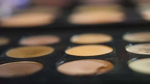 Makeup Eye Shadows Palette with Selective Focus in 4K Slow Motion Stock Footage 122576117