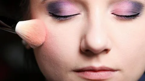 Makeup face applying rouge  blusher Stock Photos
