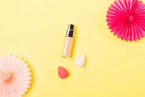 Makeup foundation cream next to egg 库存照片