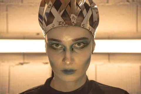 Makeup of the girl of the cold queen. Portrait of a terrible girl. Makeup for Stock Photos