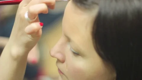 Makeup girl does makeup Stock Footage 75745756