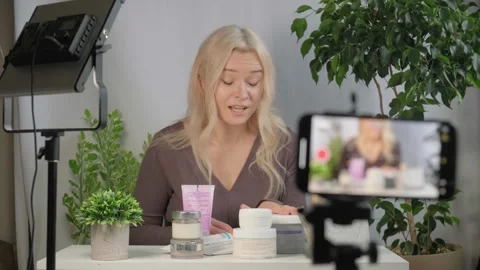 Makeup influencer or beauty vlogger face with girl using spray or sharing Stock Footage 320163297