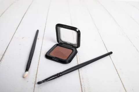 Makeup items. brown eye shadow. Stock Photos