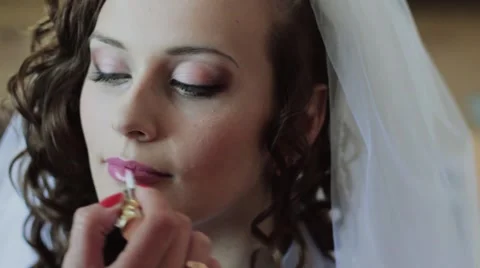 Makeup Lips For The Bride. Stock-Footage 52515429