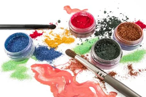 Makeup. Make-up Set. Brush.Glitter. lipgloss, rouge, eyeshadows,white background Stock Photos