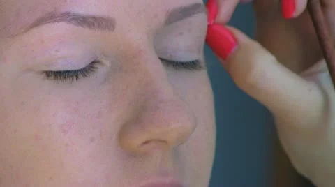 Makeup for a model Stock Footage 12097282