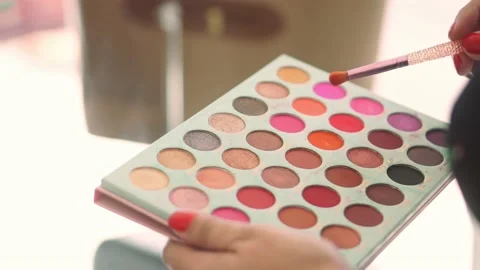 Makeup palette and brush in action before the aplication. Stock Footage 137677373
