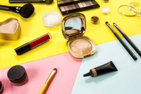 Makeup pattern background of beauty product on colorful background. Stock Photos