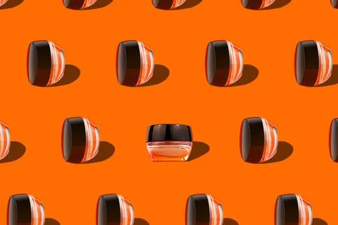 Makeup pattern face cream tonal foundation glass jar geometrical podium orang Foto stock