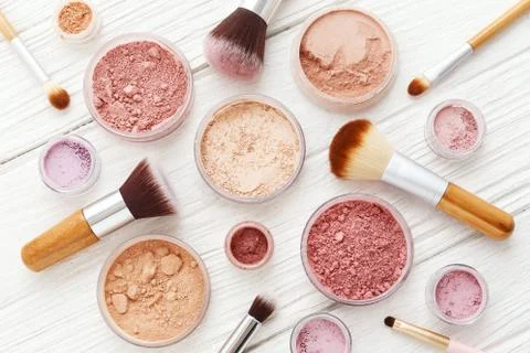Makeup powder with brushes flat lay Stock Photos
