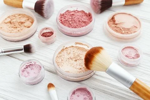 Makeup powder with brushes Stock Photos