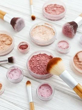 Makeup powder with brushes Stock Photos