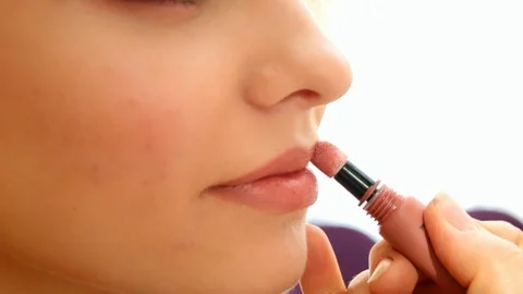 Makeup process. Master makes makeup. Makeup of bride. Girl applying lipstick Stock Footage 88987214