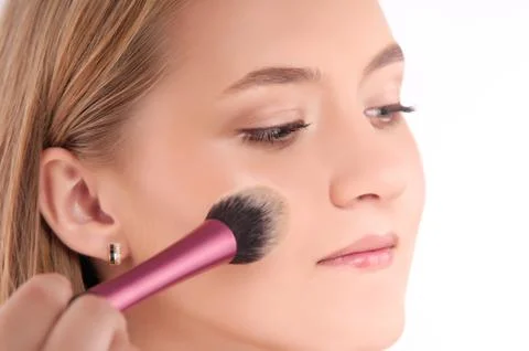 Makeup process of a young pretty girl 스톡 사진