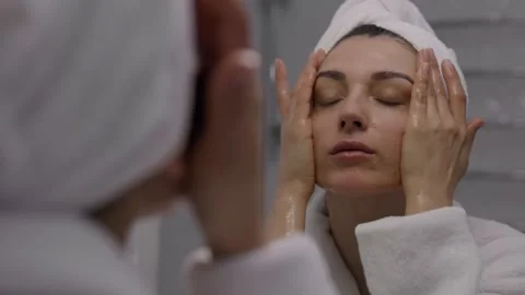 Makeup removing, with cleaning lotion and cotton pads Stock Footage 243198747