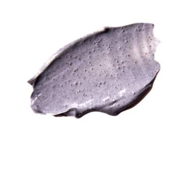 Makeup scrub smear on isolated background. Beauty product Stock Photos