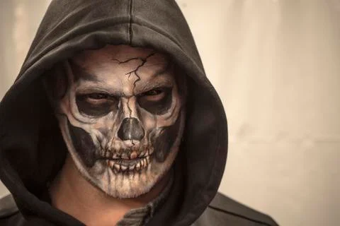 Makeup skull on white background. Portrait of a terrible skull. Portrait of a Stock Photos