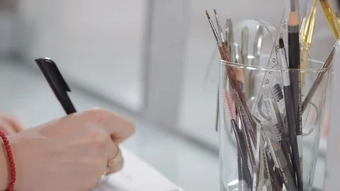 Makeup studio, signing a contract with a client Stock Footage 104647901