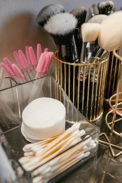Makeup Tools and Accessories on a Vanity Table Stock Photos