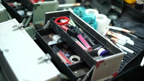 Makeup Traveling Kit Filled with Brushes and Beauty Product Stockbeeldmateriaal 313318519