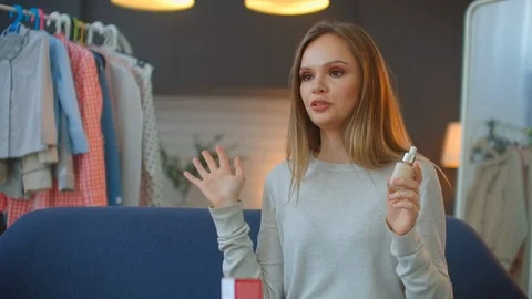 Makeup vlogger influencer creating cosmetic product explainer video. Young woman Stock Footage 118387731