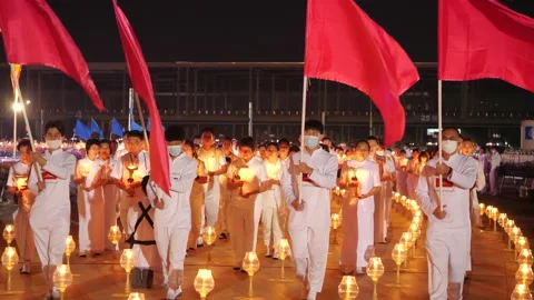 Makha Bucha Day Devotees Walk With Flags and Candles 動画素材 236371000