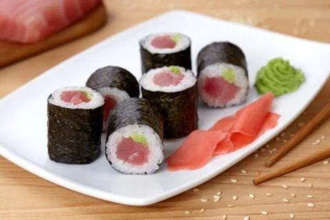 Maki sushi roll with tuna, wasabi, ginger and nori seaweed Stock Photos