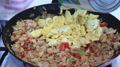 Making ackee and saltfish.  Real time. Stock Footage 170577947