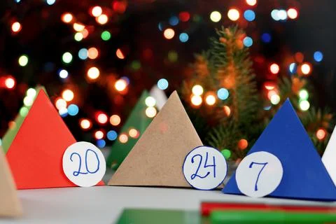 Making advent calendar in the form of multi-colored pyramids Stock Photos