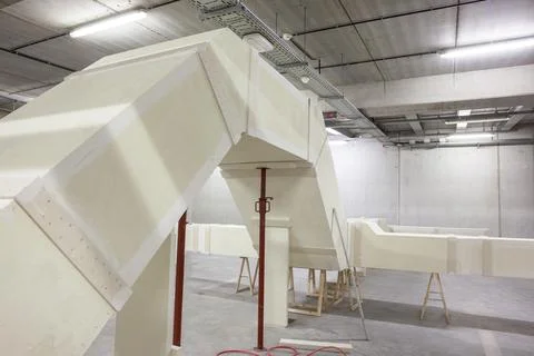 Making air duct in insulating material Stock Photos