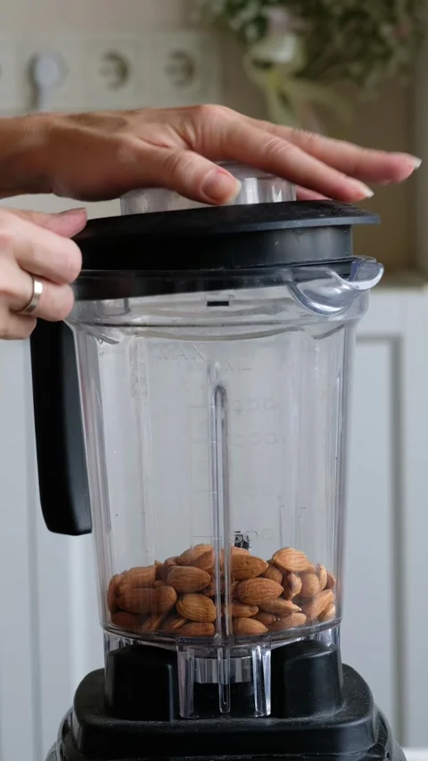 Making Almond Flour in flour processor, blender Stock Footage 163052474