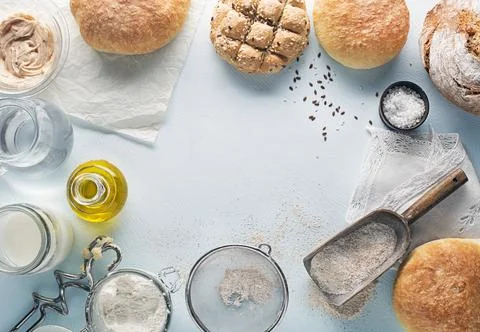 Making and baking concept for Bread with ingredients on blue background Stock Photos
