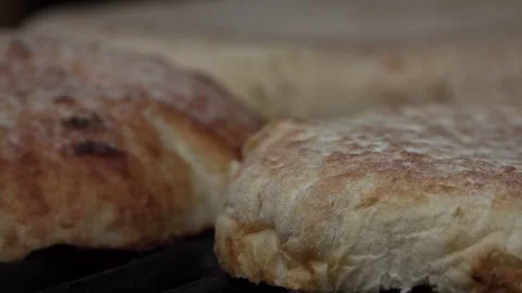 Making and grilling burger buns on an grill Stock Footage 250157818