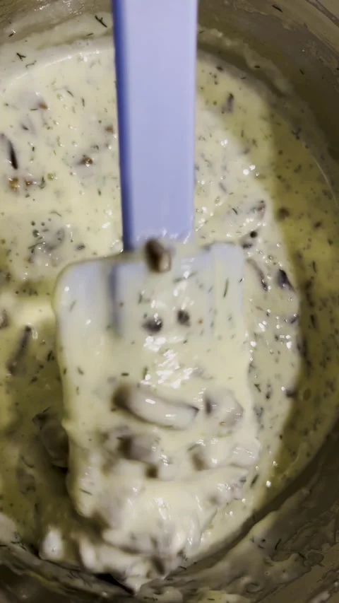 Making and mixing homemade processed cheese with mushrooms. Vertical video. Stock Footage 299710622