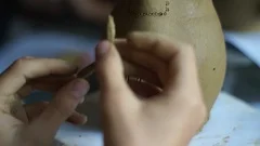 Potter Hands Making In Clay On Pottery Wheel. Potter Makes A