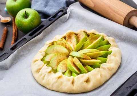 Making apple galette Stock Photos